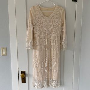 Cream embroidered floral dress.